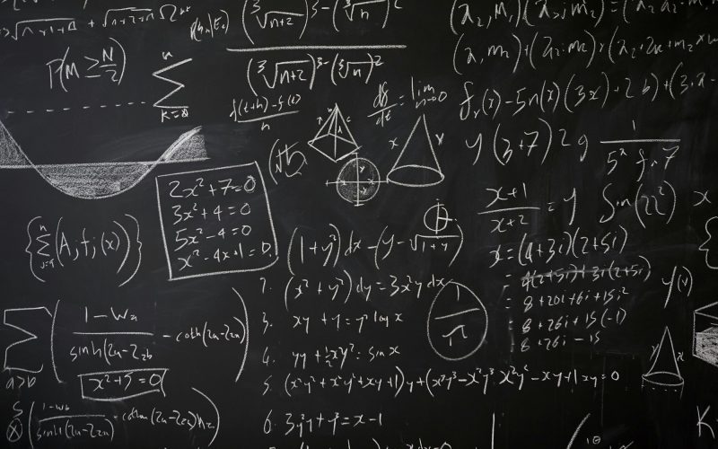 Blackboard with maths statistics, equations and ideas